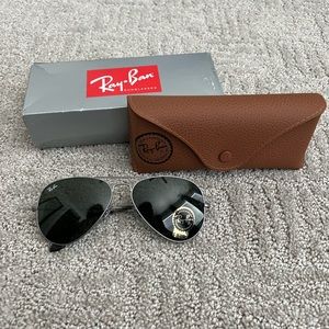 Ray-Ban sunglasses.